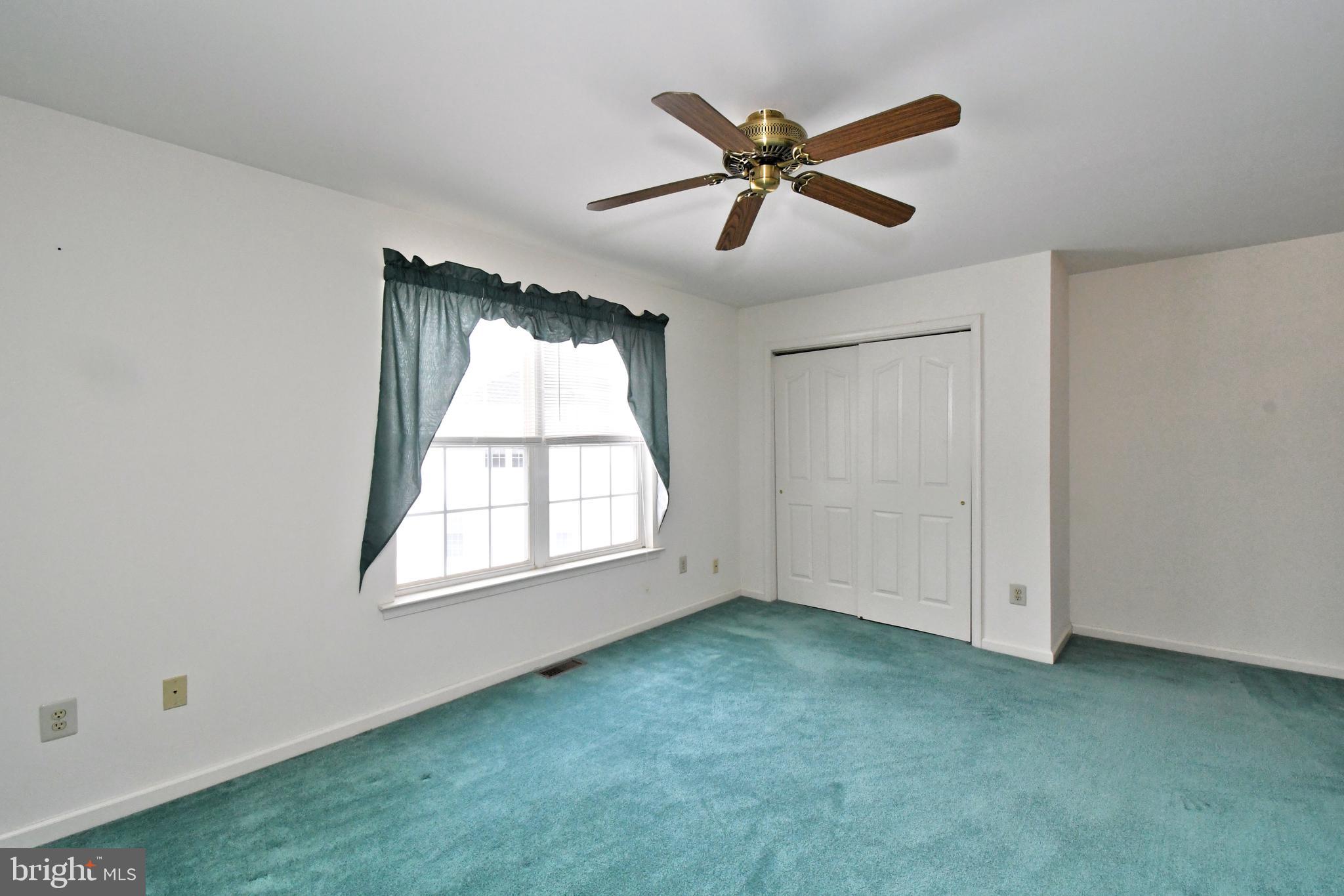 425 Ruth Court Harleysville, PA 19438 - Photo 22 of 26 a view of a big room with windows and closet