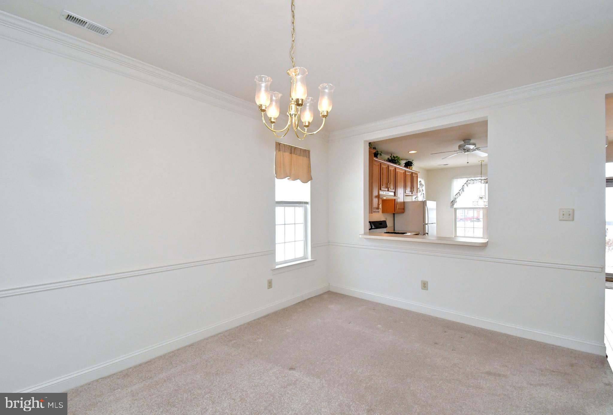 425 Ruth Court Harleysville, PA 19438 - Photo 3 of 26 a view of an empty room with a window