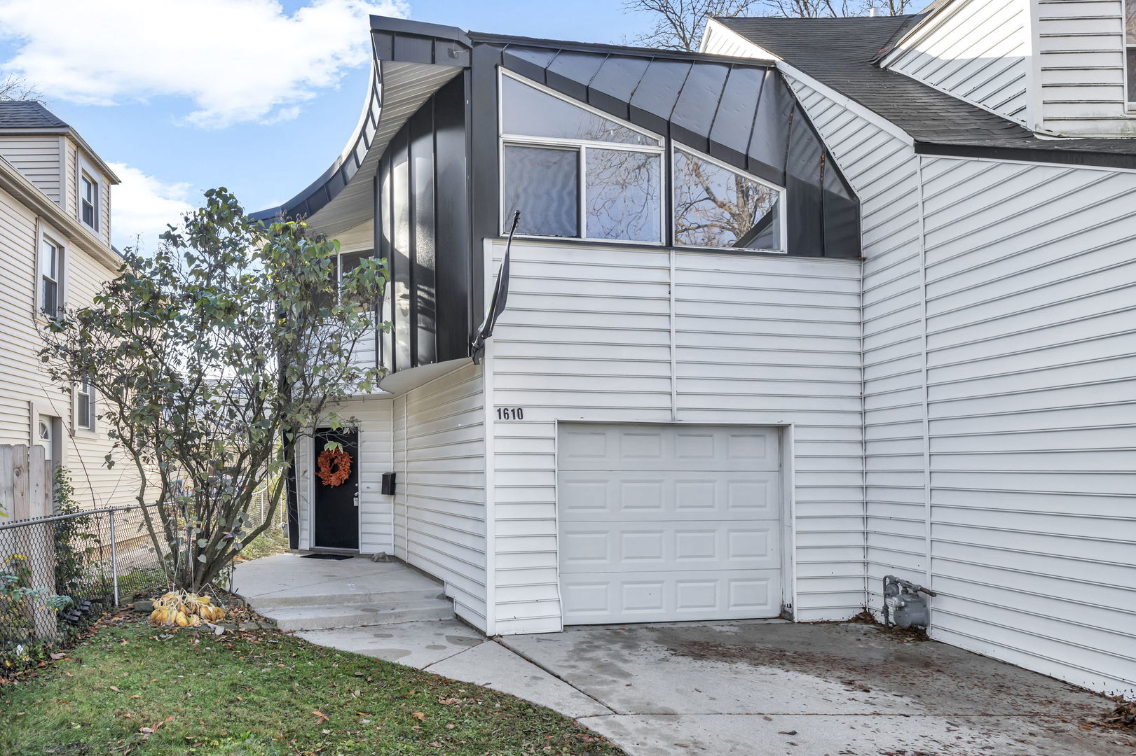 1610 Dempster Street Evanston, IL 60202 - Photo 2 of 28 a view of a house with a small cabin