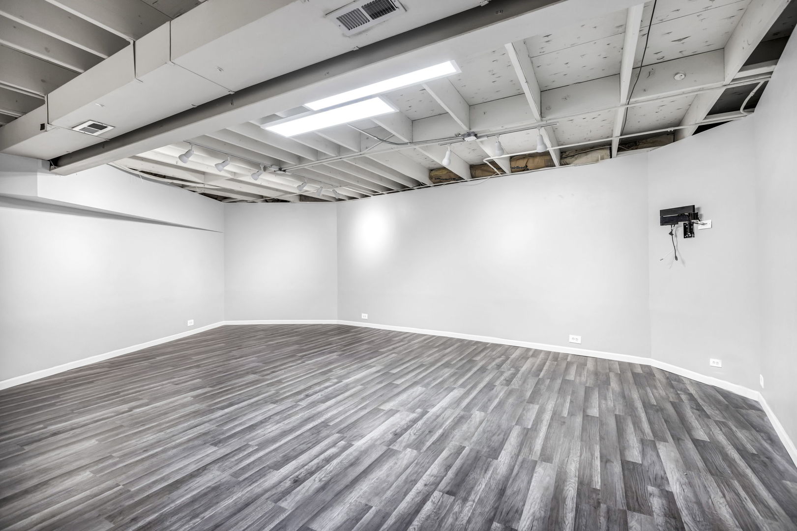 1610 Dempster Street Evanston, IL 60202 - Photo 21 of 28 a view of a room with wooden floor