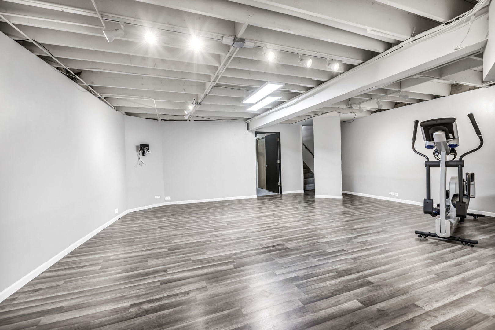 1610 Dempster Street Evanston, IL 60202 - Photo 22 of 28 a view of a room with wooden floor