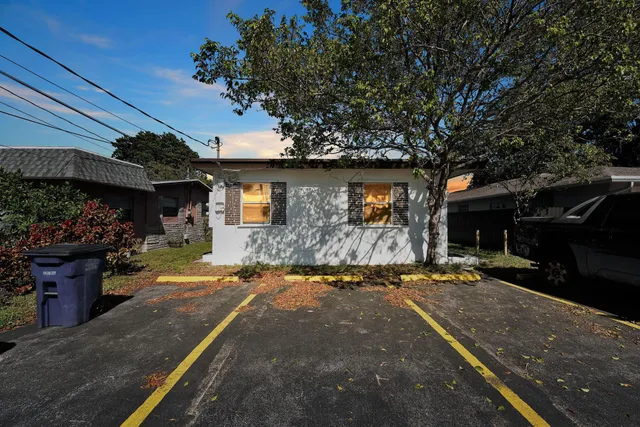 a view of a street with cars