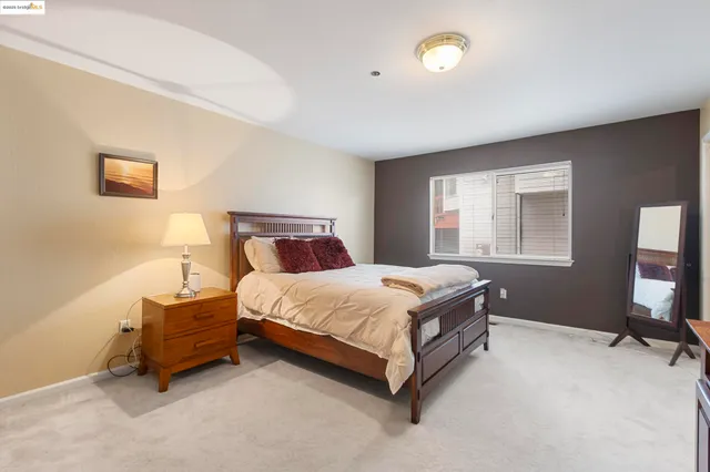 a bathroom with a sink double vanity and a mirror