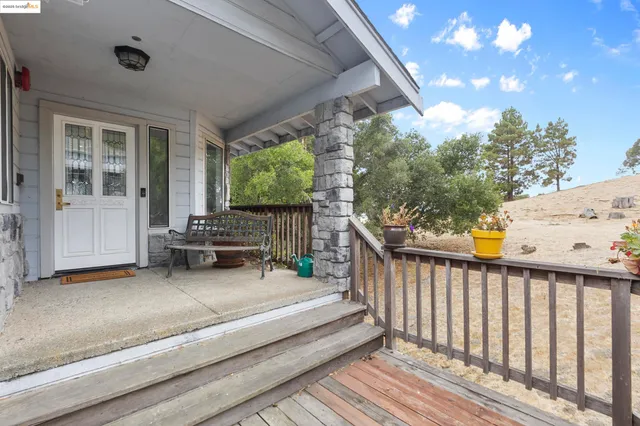 a view of two chairs in the roof deck