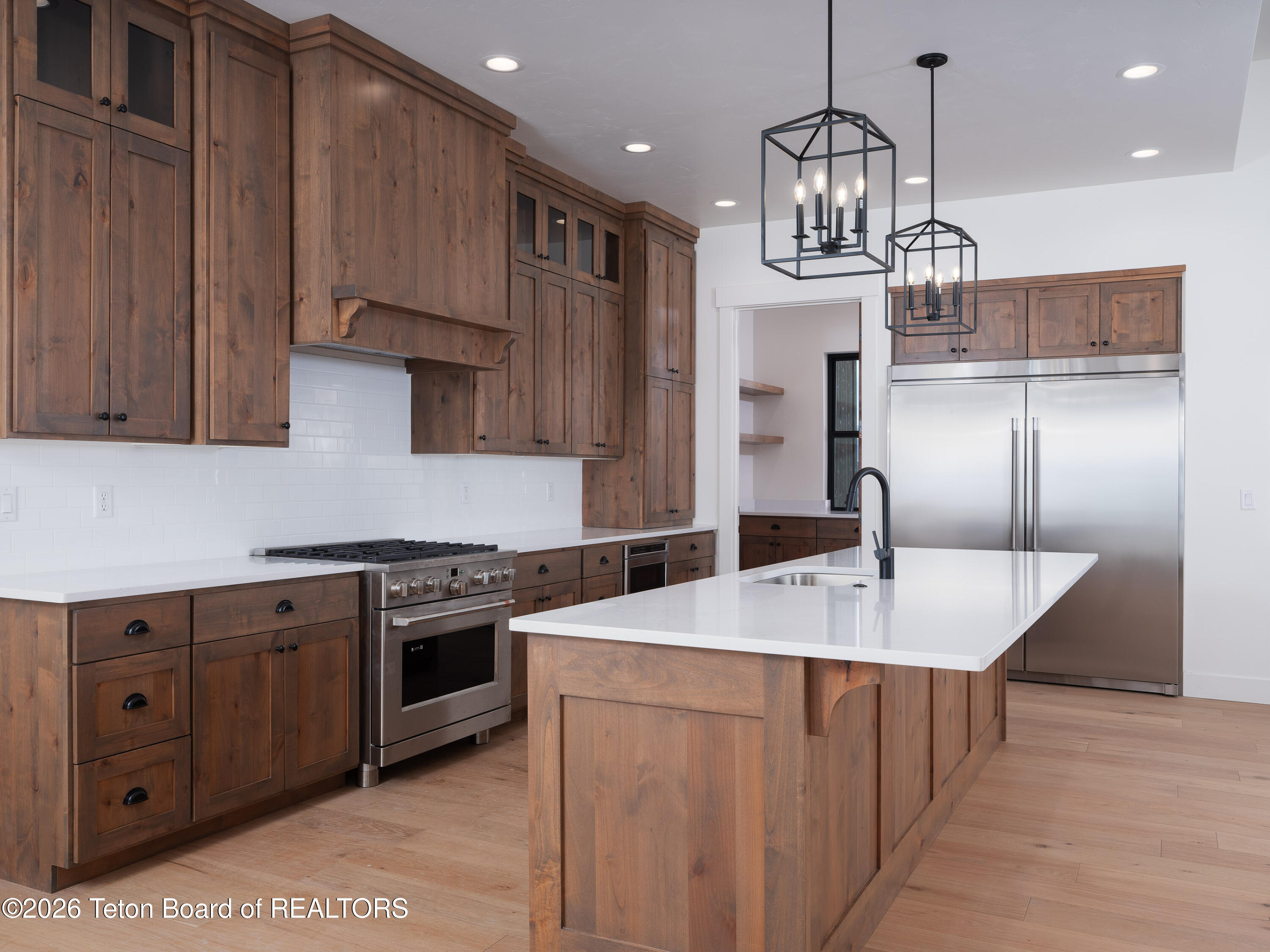 706 Royal Elk Circle Victor, ID 83455 - Photo 4 of 29 04 kitchen 2