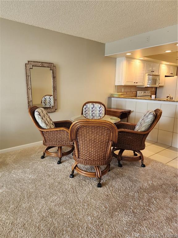 1950 Southwest Palm City Road, Unit 13102 Stuart, FL 34994 - Photo 28 of 40 a living room with furniture and a window