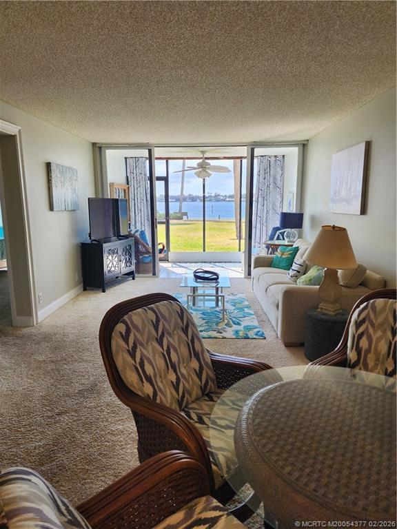 1950 Southwest Palm City Road, Unit 13102 Stuart, FL 34994 - Photo 29 of 40 a living room with furniture