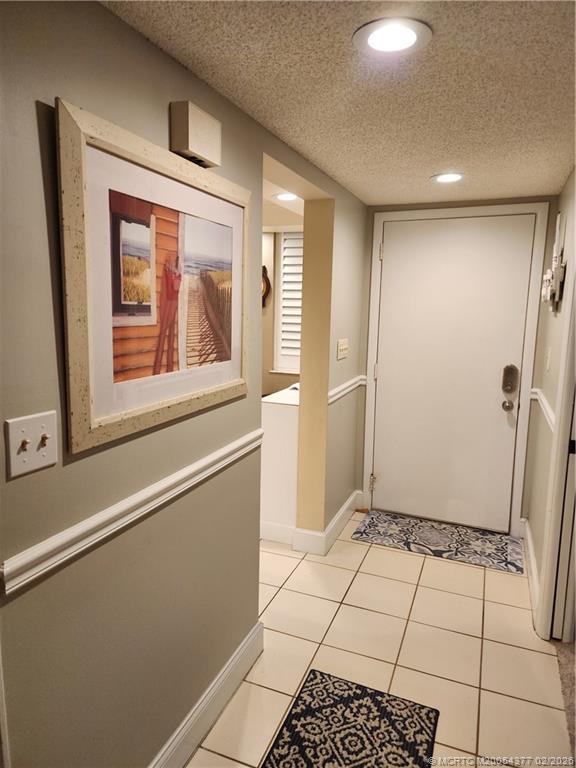 1950 Southwest Palm City Road, Unit 13102 Stuart, FL 34994 - Photo 39 of 40 a view of an empty room with a window