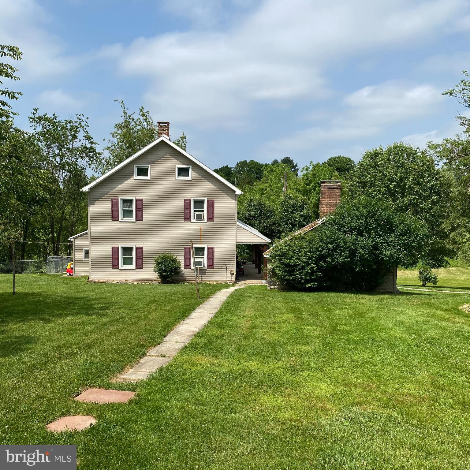 61 Baltimore Street Spring Grove, PA 17362 - Photo 1 of 51 a front view of a house with a yard