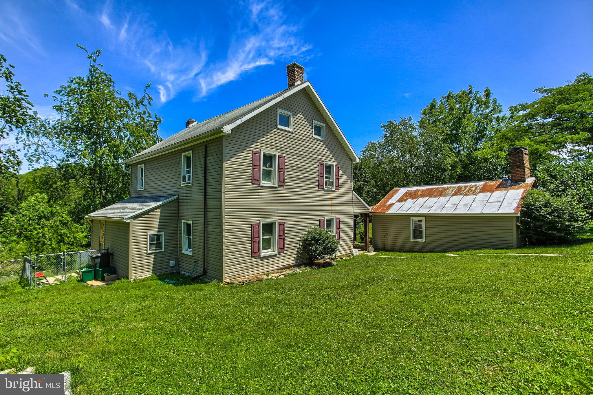 61 Baltimore Street Spring Grove, PA 17362 - Photo 38 of 51 a front view of house with yard and green space