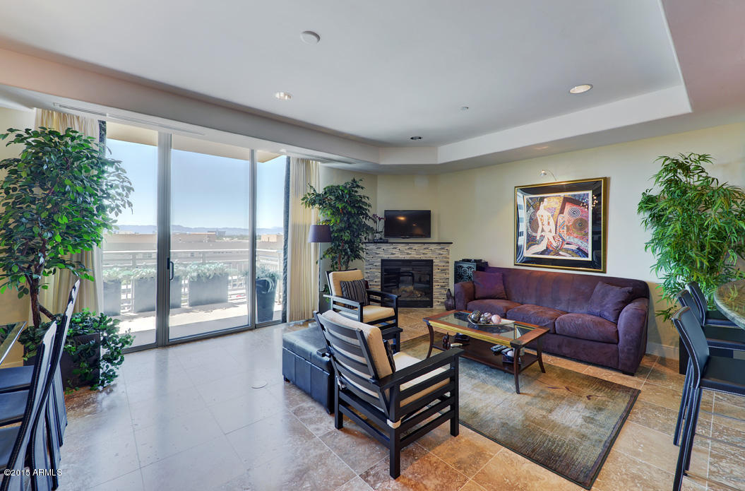 2211 East Camelback Road, Unit 606 Phoenix, AZ 85016 - Photo 10 of 32 Family Room, FP and View.jpg