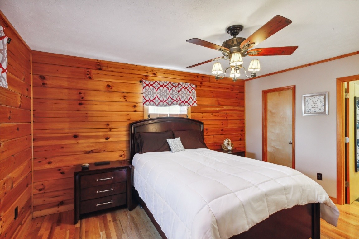 2000 Blue Well Road Lebanon, TN 37090 - Photo 25 of 39 a bedroom with a bed and a chandelier
