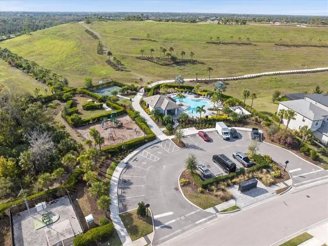 an aerial view of a house with a ocean view