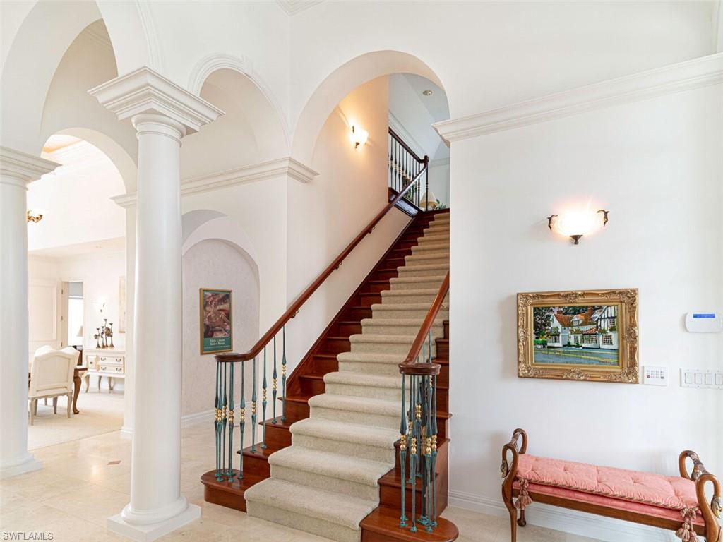330 Devils Bight Naples, FL 34103 - Photo 21 of 47 a view of entryway and hall with wooden floor