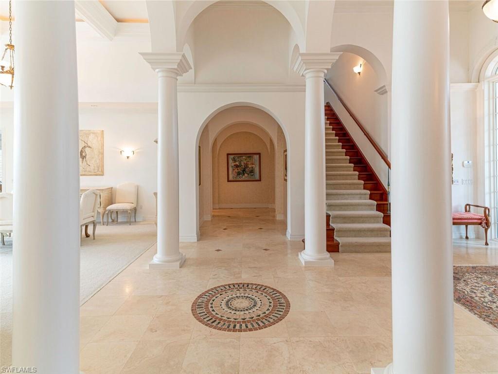 330 Devils Bight Naples, FL 34103 - Photo 23 of 47 a view of livingroom with furniture and floor to ceiling window