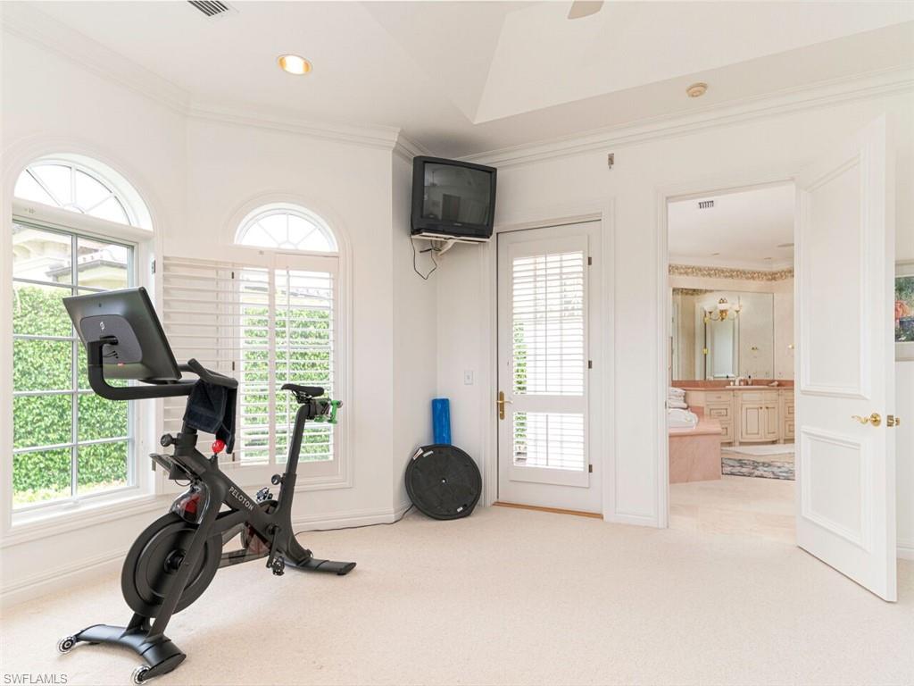 330 Devils Bight Naples, FL 34103 - Photo 35 of 47 a view of a livingroom with furniture and a large window