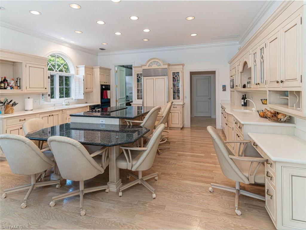 330 Devils Bight Naples, FL 34103 - Photo 38 of 47 a view of a dining room with furniture