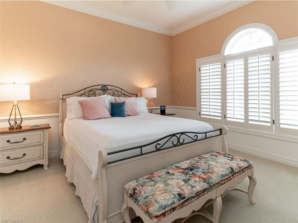 330 Devils Bight Naples, FL 34103 - Photo 40 of 47 a bedroom with a bed and a window