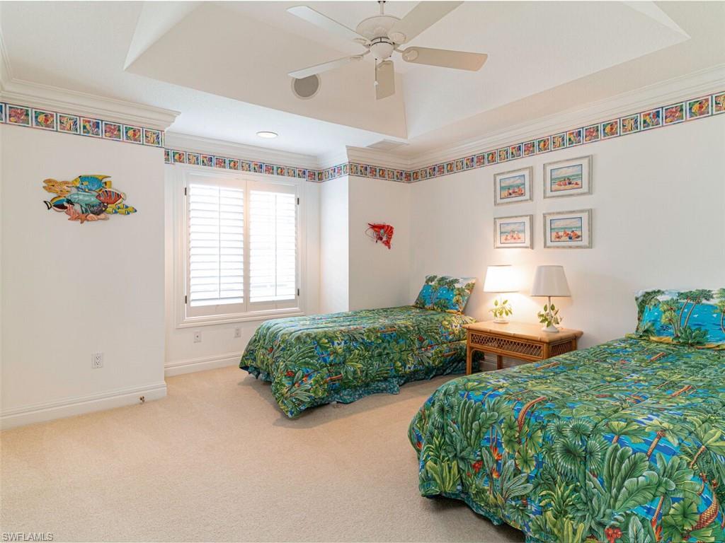 330 Devils Bight Naples, FL 34103 - Photo 43 of 47 a bedroom with two beds and potted plant
