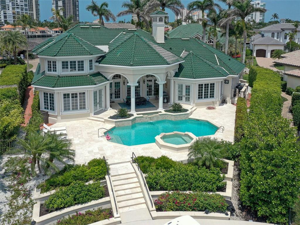 330 Devils Bight Naples, FL 34103 - Photo 9 of 47 an aerial view of a house