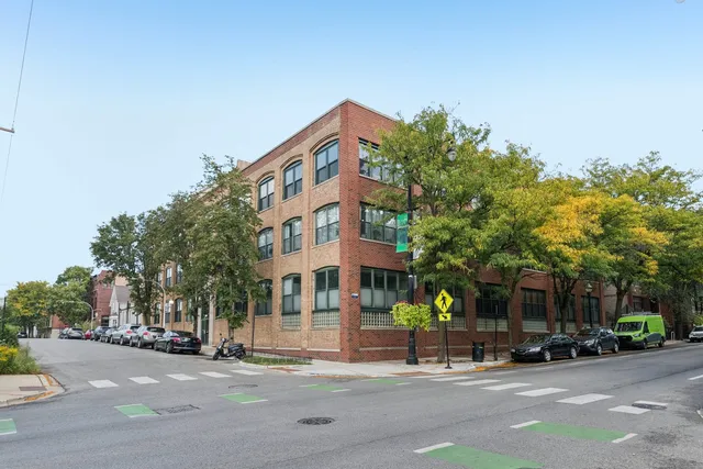 a building with trees in front of it