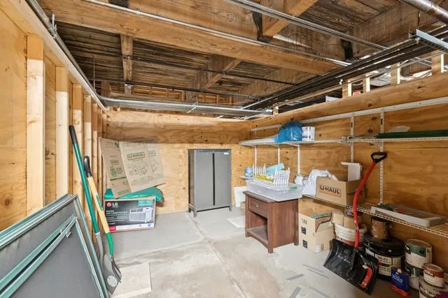 a room with lots of furniture and lots of wooden furniture