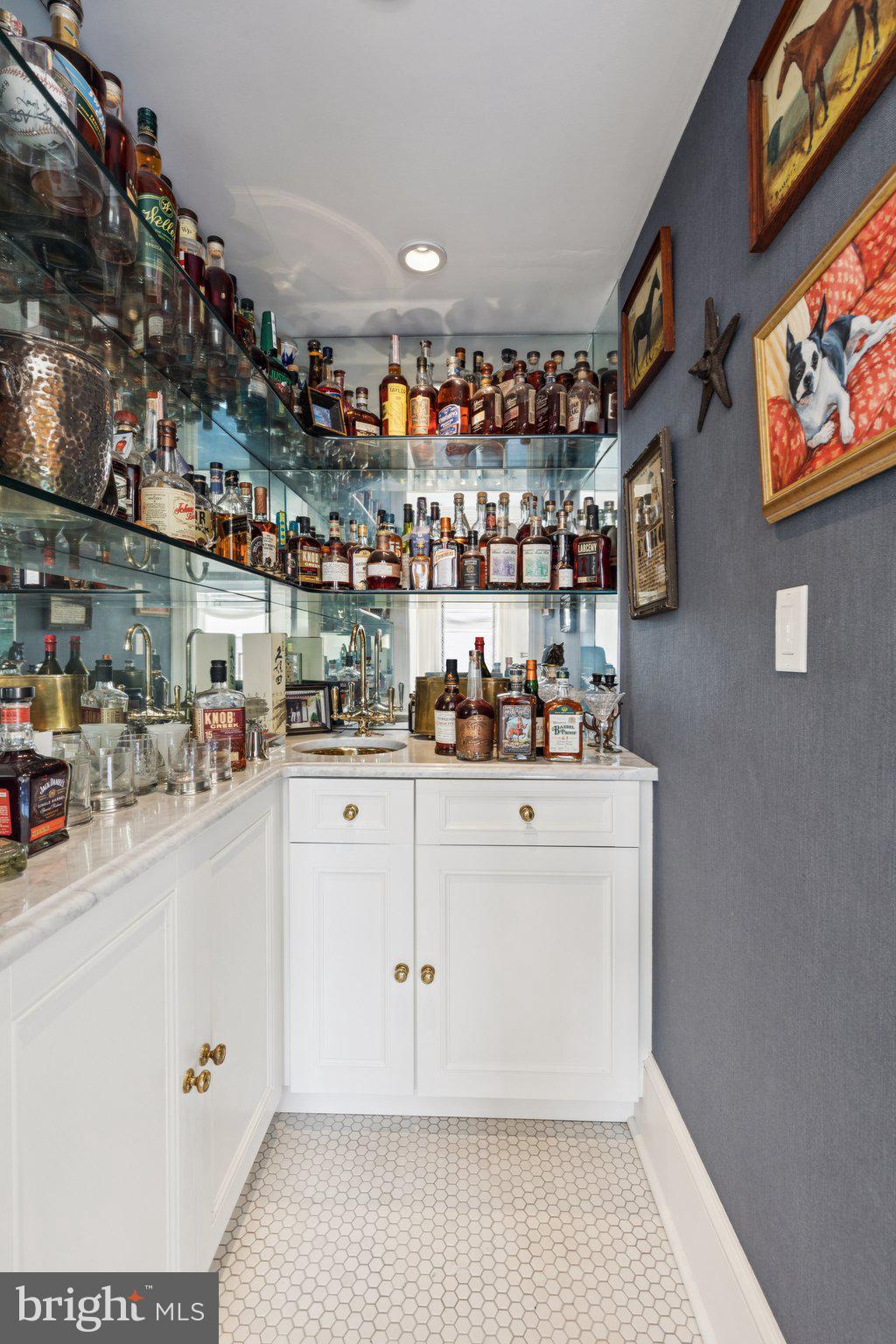 237-47 South 18th Street, Unit 4D Philadelphia, PA 19103 - Photo 13 of 19 a kitchen with stainless steel appliances cabinets and a counter top