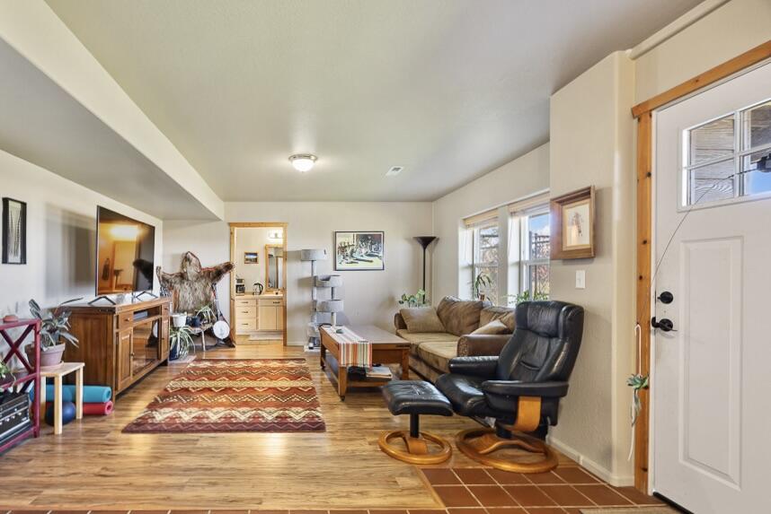 13351 Crystal Springs Road Klamath Falls, OR 97603 - Photo 42 of 51 a living room with furniture and a flat screen tv