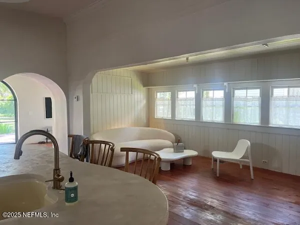 a living room with furniture and window