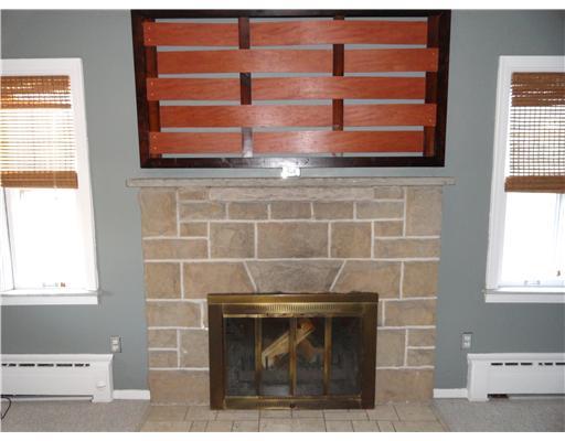 531 Thompson Run Road Pittsburgh, PA 15237 - Photo 3 of 18 Living Room. Stone log burning fireplace really sets the tone in this room.
