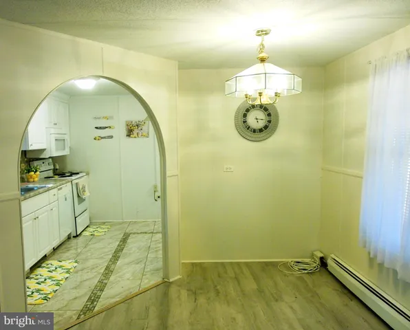 a bathroom with a sink a mirror and window
