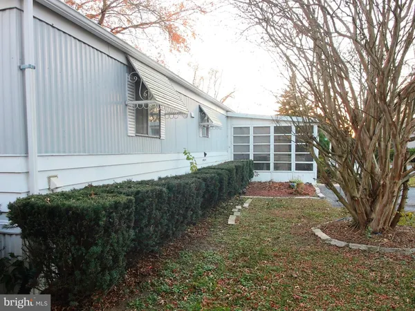 a front view of house with yard