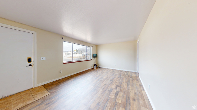 1348 Sagewood Road Price, UT 84501 - Photo 3 of 34 Foyer with light wood finished floors and baseboards