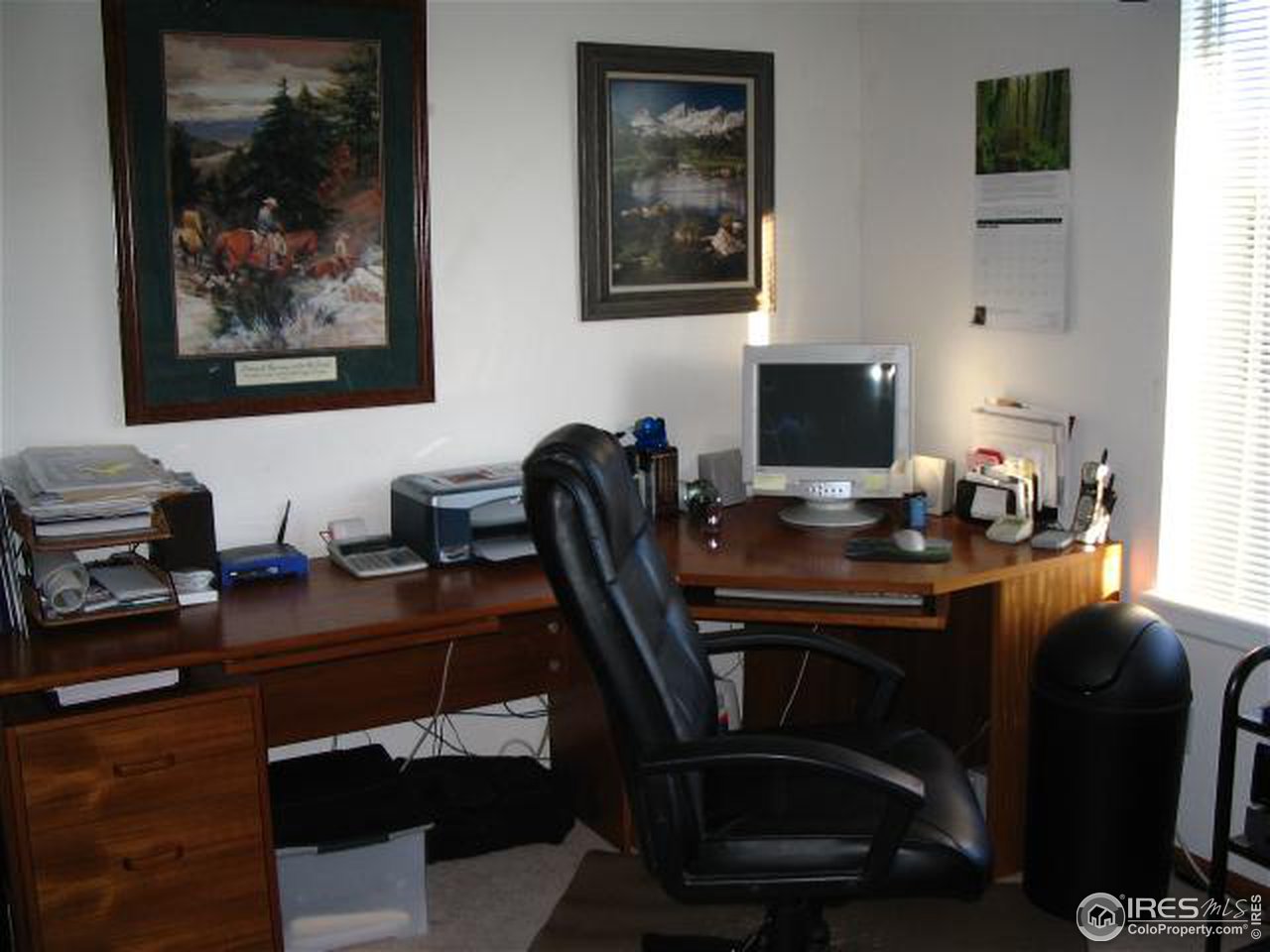 10015 Silver Maple Road Littleton, CO 80129 - Photo 11 of 11 a view of a workspace with furniture and a window