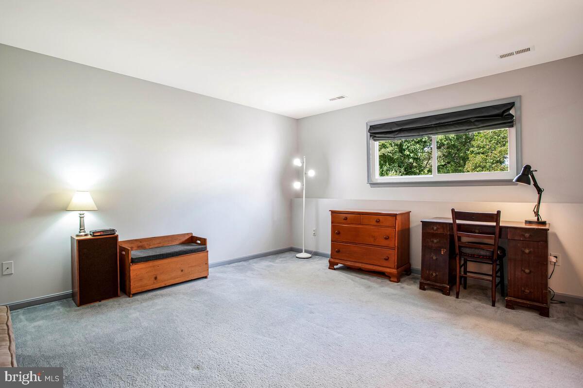 70 South View Drive Huntingtown, MD 20639 - Photo 24 of 34 a living room with furniture and a window