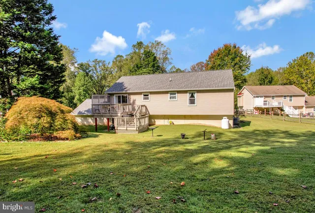 a view of a house with a big yard