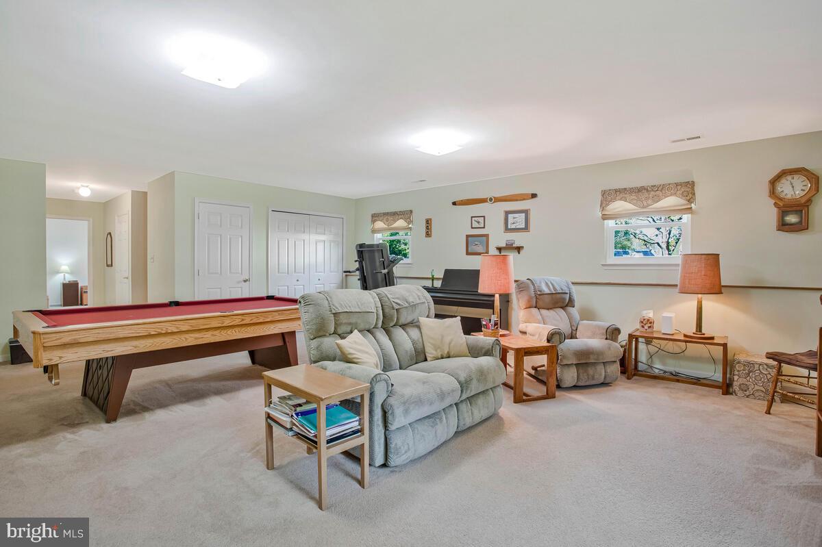 70 South View Drive Huntingtown, MD 20639 - Photo 4 of 34 a living room with furniture a lamp and a window