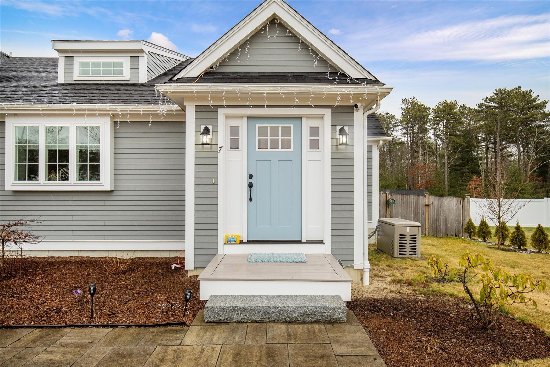 7 Maxwell Lane Sandwich, MA 02563 - Photo 2 of 54 a front view of a house with a porch