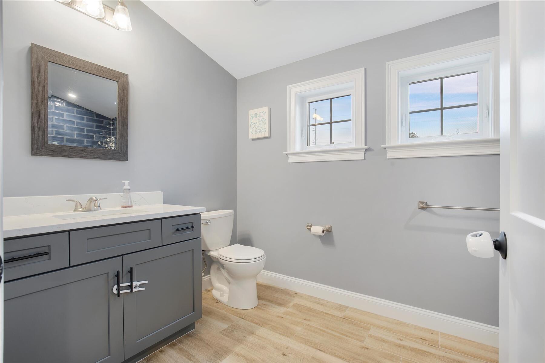 7 Maxwell Lane Sandwich, MA 02563 - Photo 27 of 54 a bathroom with a sink toilet and vanity