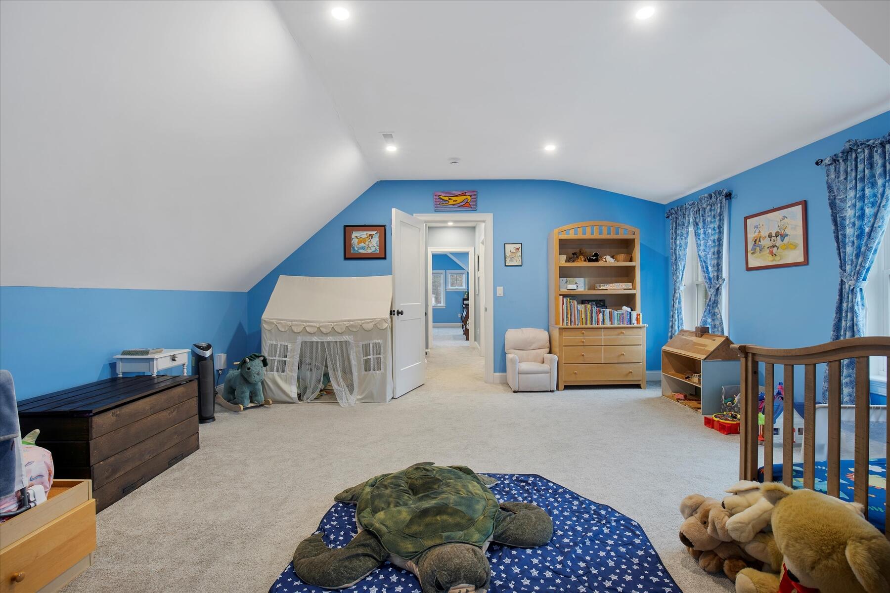 7 Maxwell Lane Sandwich, MA 02563 - Photo 28 of 54 a living room with furniture and a baby crib with rug