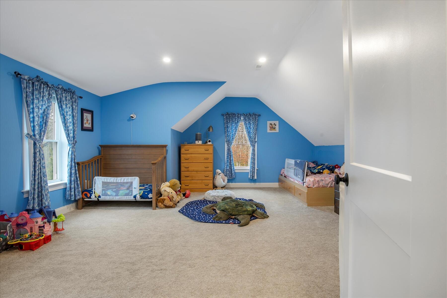 7 Maxwell Lane Sandwich, MA 02563 - Photo 30 of 54 a bedroom with furniture and a baby crib