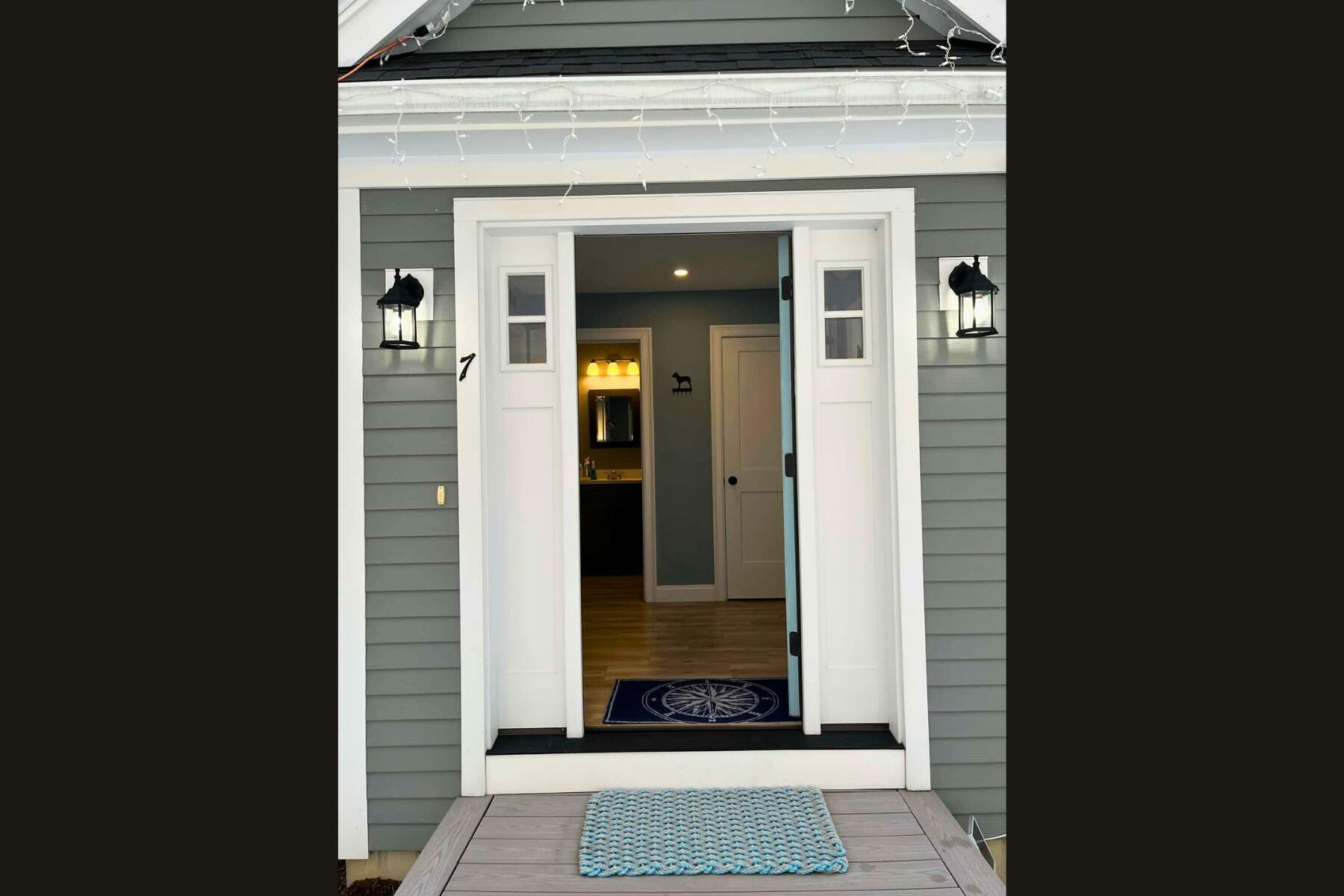 7 Maxwell Lane Sandwich, MA 02563 - Photo 3 of 54 a view of a entryway door of the house