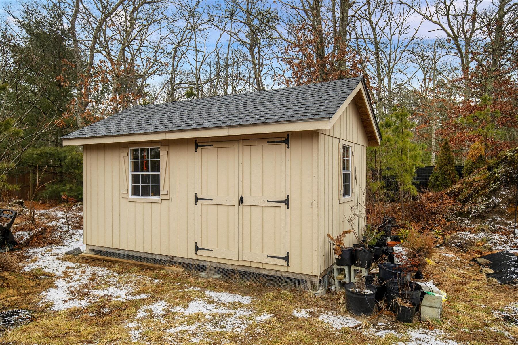 7 Maxwell Lane Sandwich, MA 02563 - Photo 40 of 54 a backyard of a house