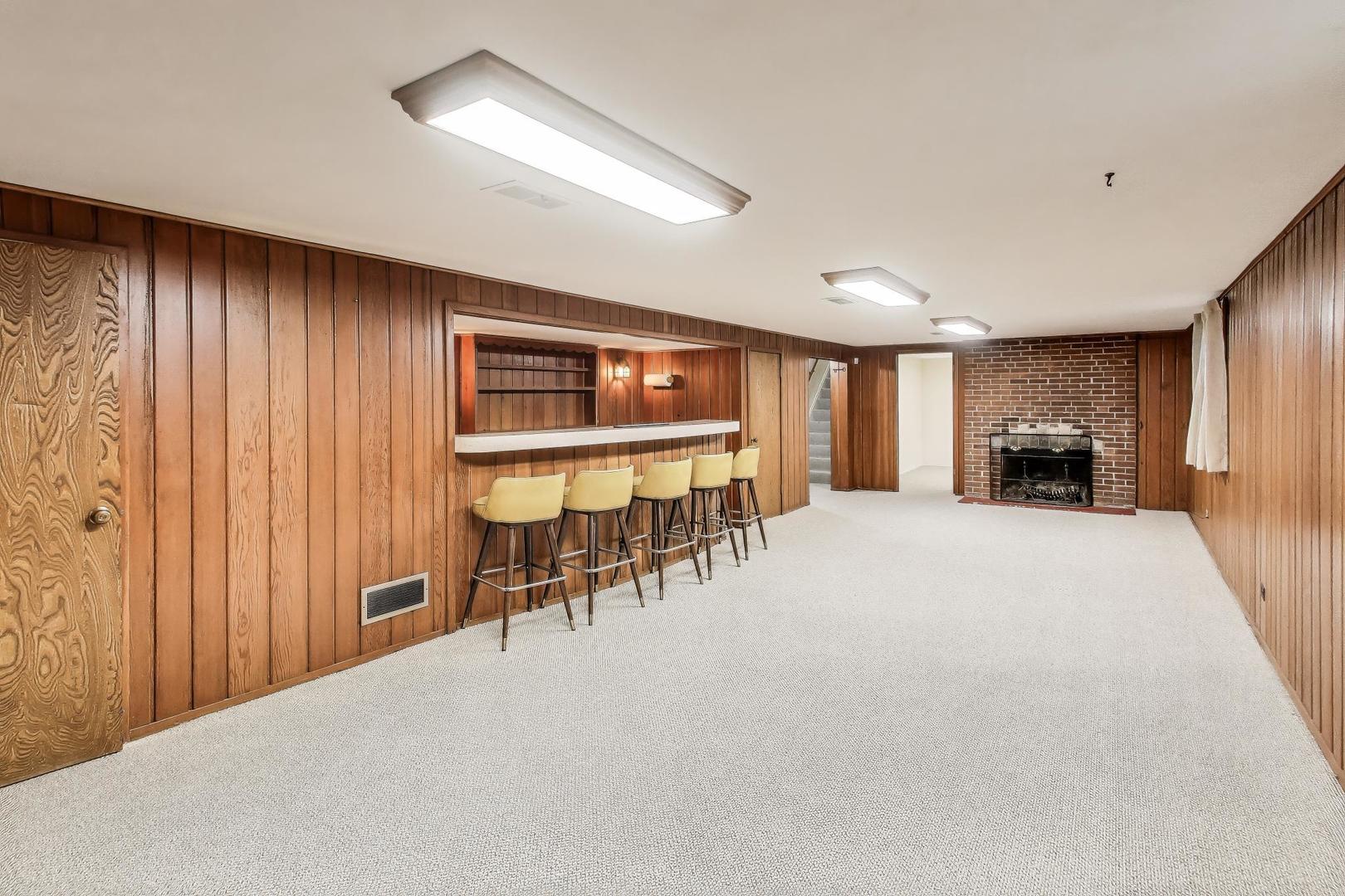3801 Madison Street Oak Brook, IL 60523 - Photo 9 of 11 a living room with furniture and a large window