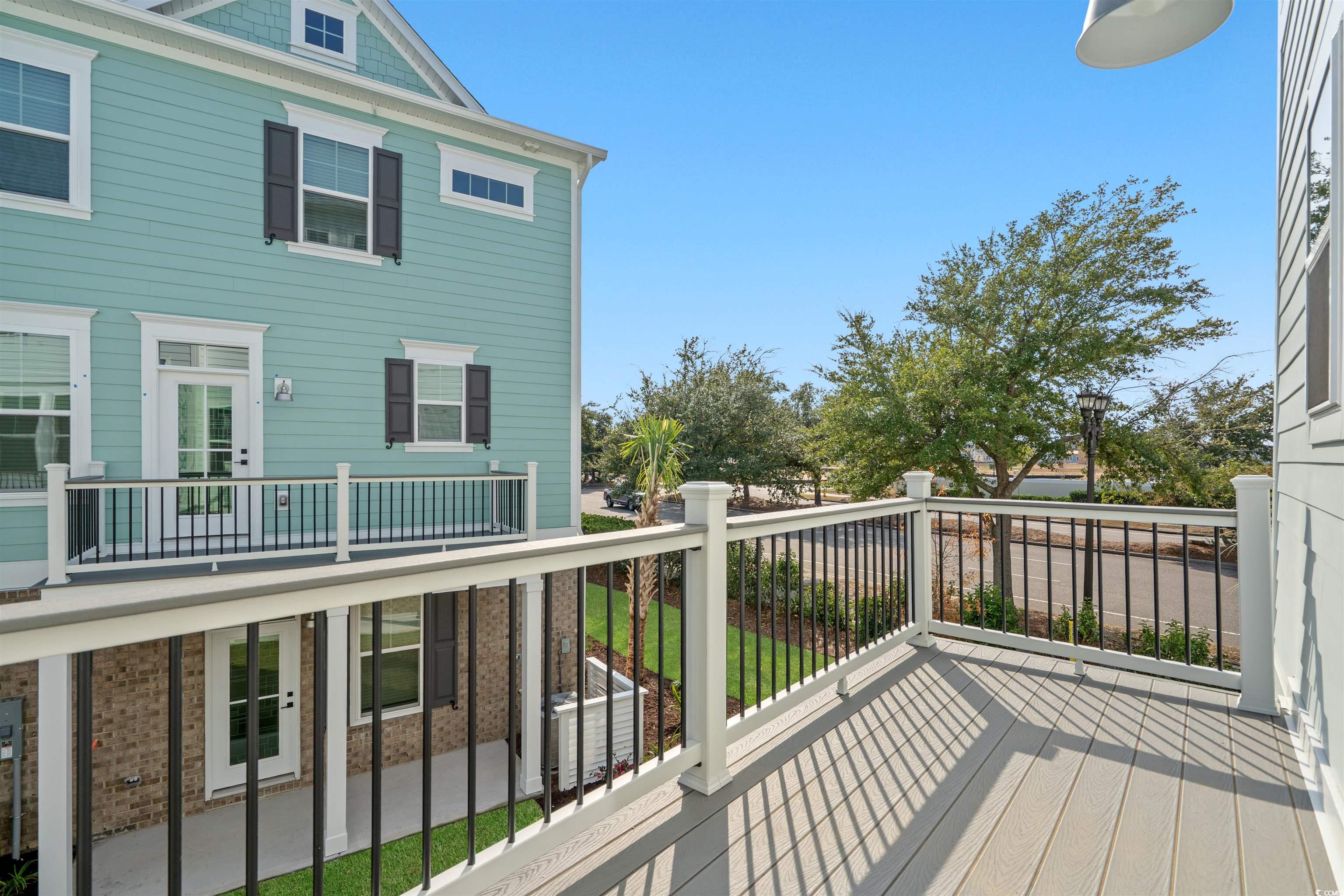 8476 Duke Place, Unit 32 Myrtle Beach, SC 29572 - Photo 19 of 40 Deck with a patio area