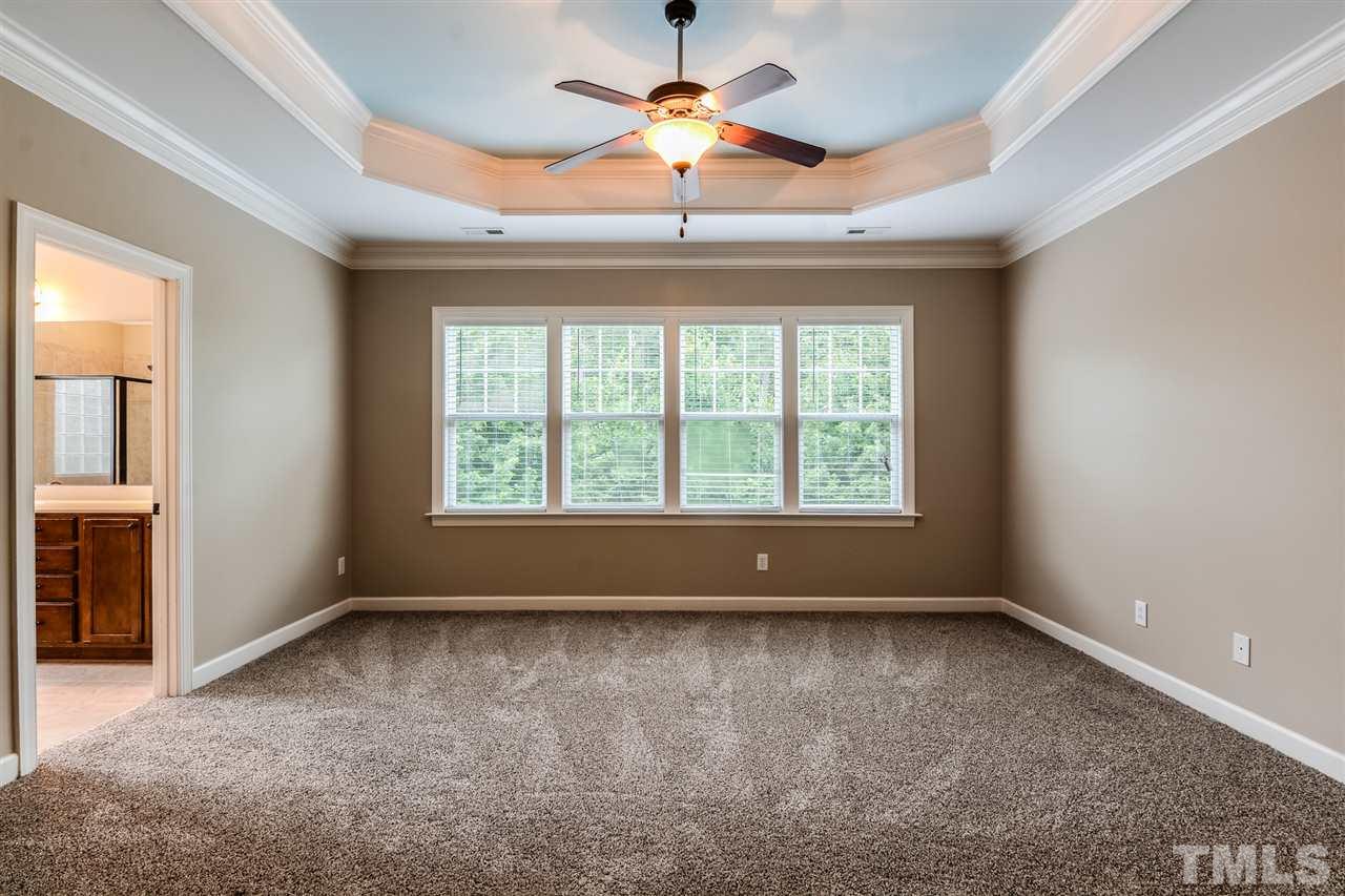 2261 Dunlin Lane Raleigh, NC 27614 - Photo 11 of 25 a view of room with a ceiling fan and window
