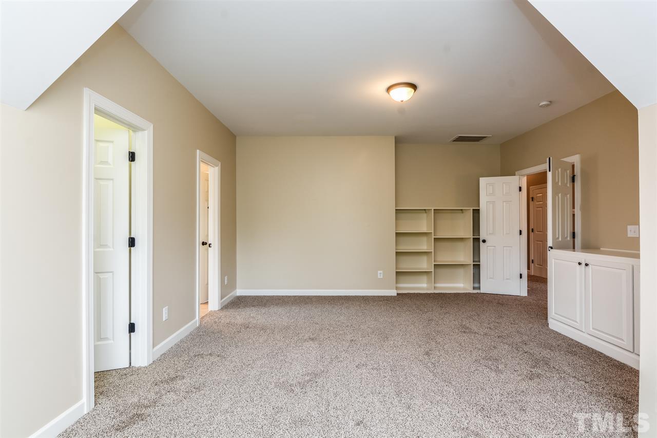 2261 Dunlin Lane Raleigh, NC 27614 - Photo 16 of 25 a view of room with walk in closet