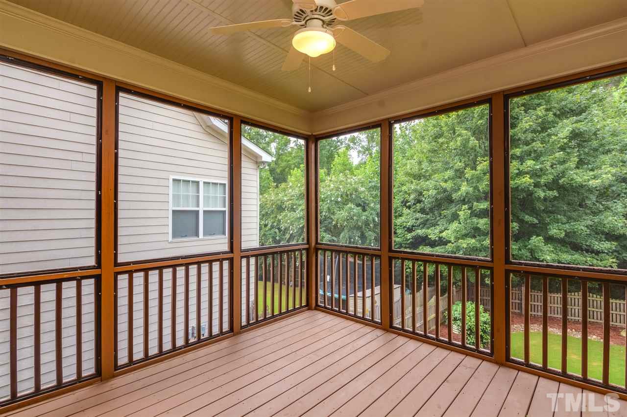 2261 Dunlin Lane Raleigh, NC 27614 - Photo 24 of 25 a view of a balcony with wooden floor and a ceiling fan
