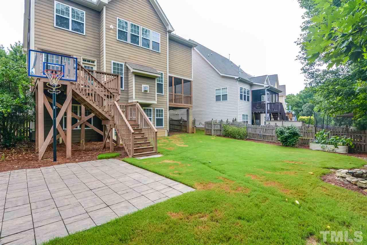 2261 Dunlin Lane Raleigh, NC 27614 - Photo 25 of 25 a view of a house with a yard and plants