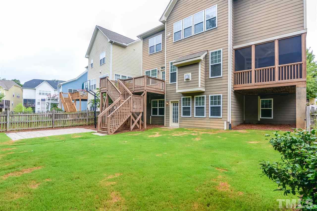 2261 Dunlin Lane Raleigh, NC 27614 - Photo 5 of 25 a view of a house with a yard and a large window